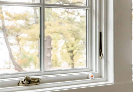 Awning windows with grilles and hardware